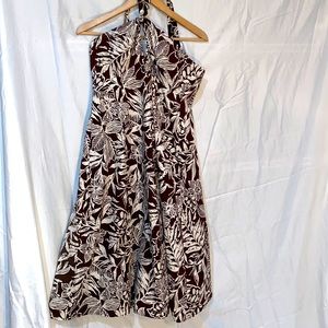 The dress is a flare out dress . The material is 97% cotton and 3% Spandex